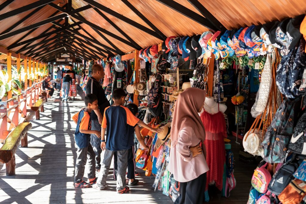 people shopping at the tourist centre in Semporna, sabah, malaysia