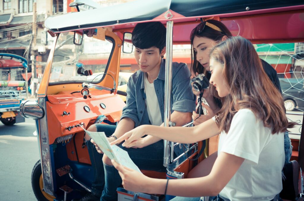 Travel Tips in Thailand Group Of Tourists In Tuk Tuk