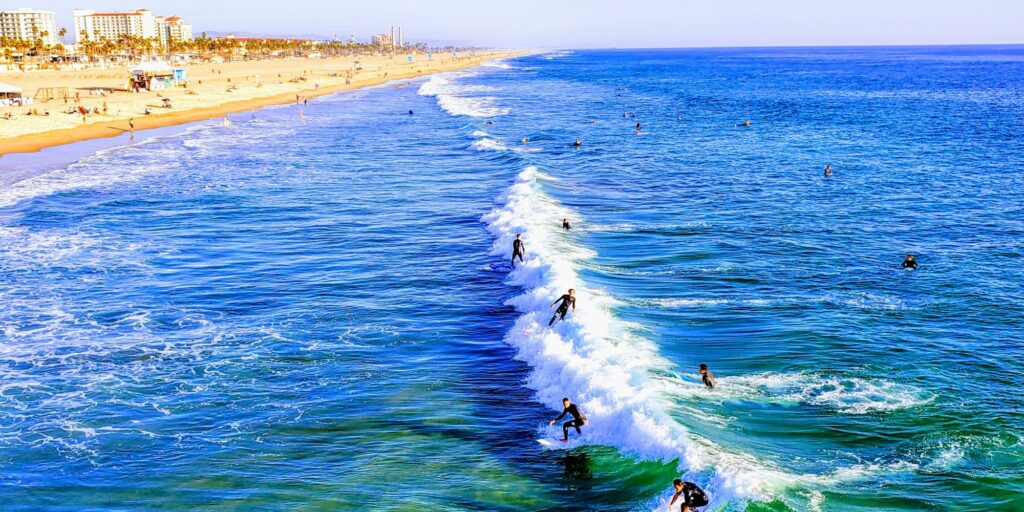 Huntington Beach surfers riding the waves