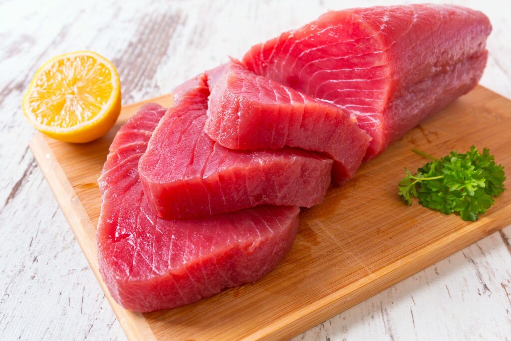 Fresh Southern Bluefin Tuna with a sliced lemon and parsley