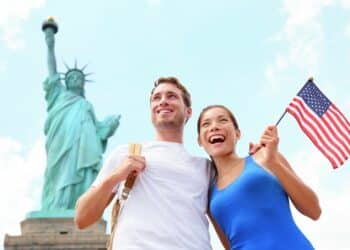Top Places To Visit In The USA Couple Tourist In Statue Of Liberty