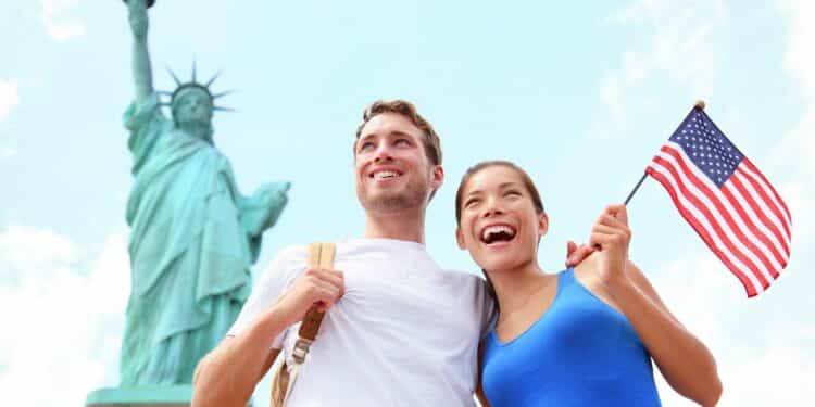 Top Places To Visit In The USA Couple Tourist In Statue Of Liberty