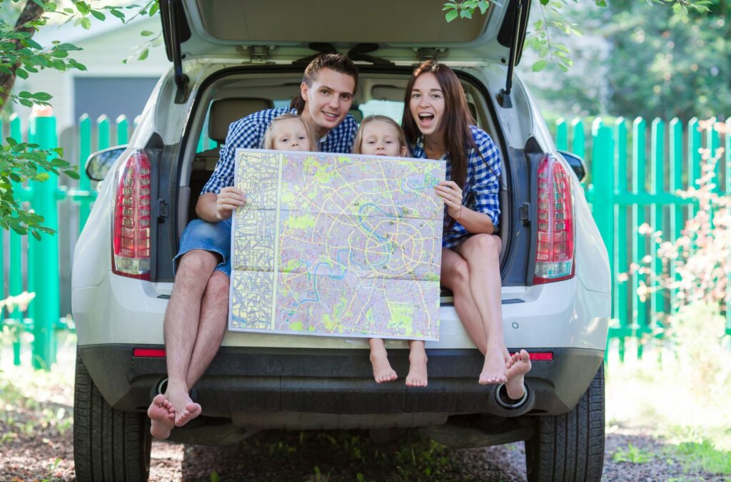 Family Planning Route And Itinerary For A Family Road Trip (Source: Canva)