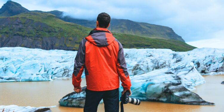 Photography Tour of Iceland: Landscape photographer taking photo in Iceland's glacier lagoon