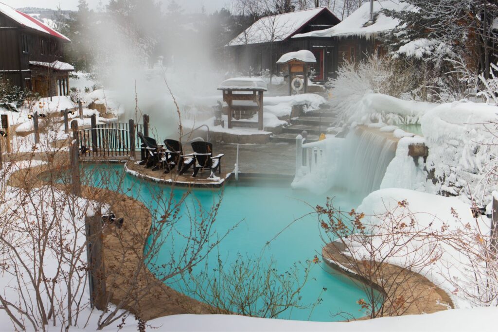 Luxurious outdoor spa in snowy landscape and hot spring