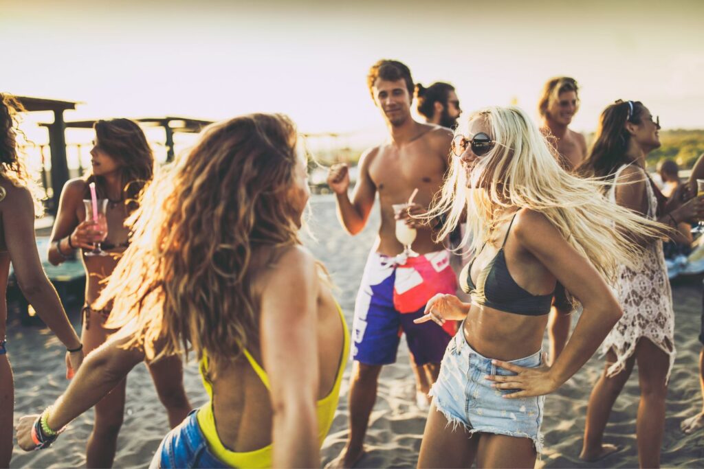 People dancing and having fun on Mediterranean party islands
