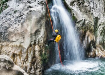 Canyoneer Exploring the Best Canyoning Destinations (Source: Canva)