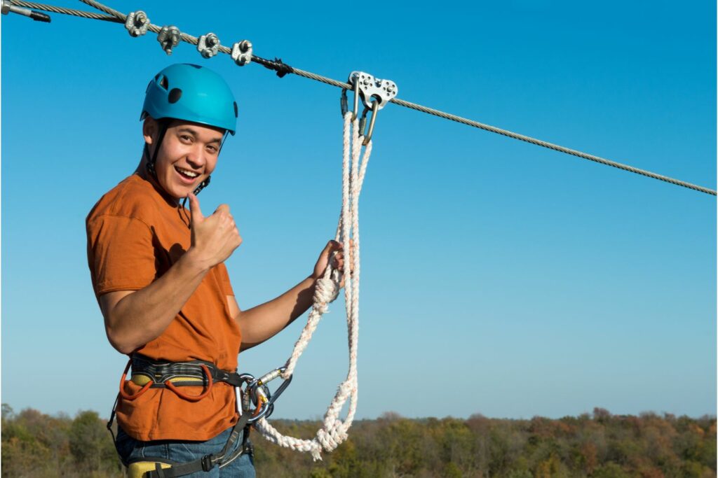 A Young Man Wearing Zipline Safety Gears (Source: Canva) 