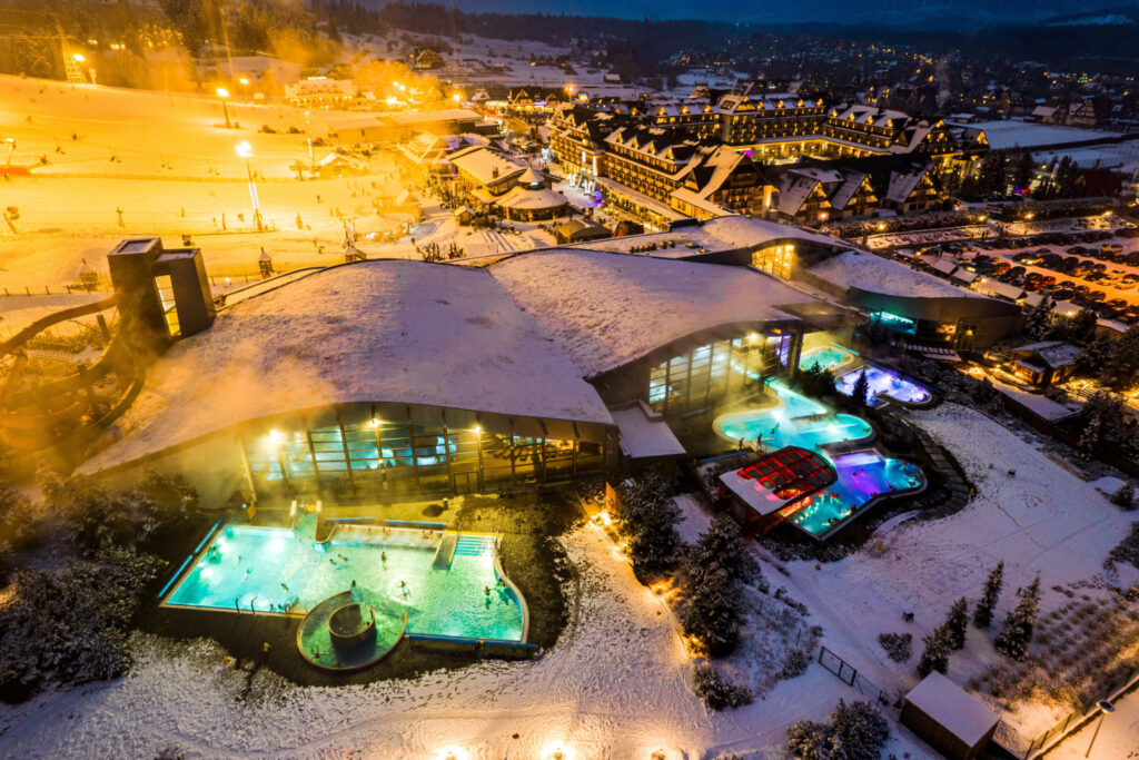 things to do in poland: winter night at bania thermal baths