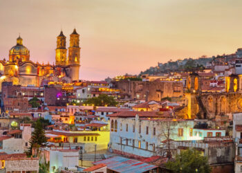 the best vacation spots in mexico panorama of Taxco city at sunset