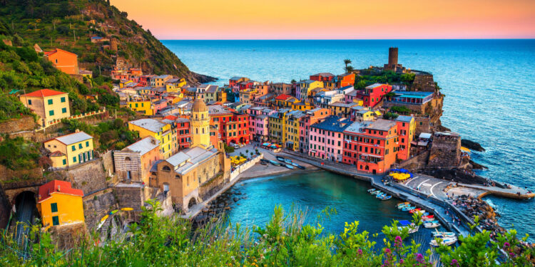 majestic cinque terre towns - mediterranean buildings on the hill