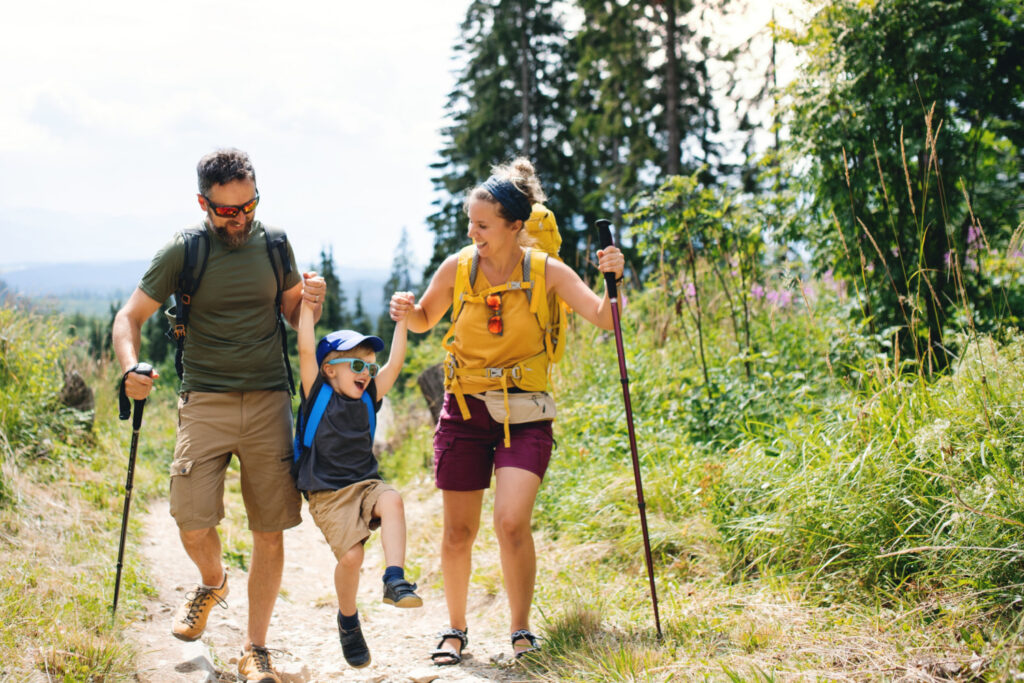 family embracing the benefits of hiking together