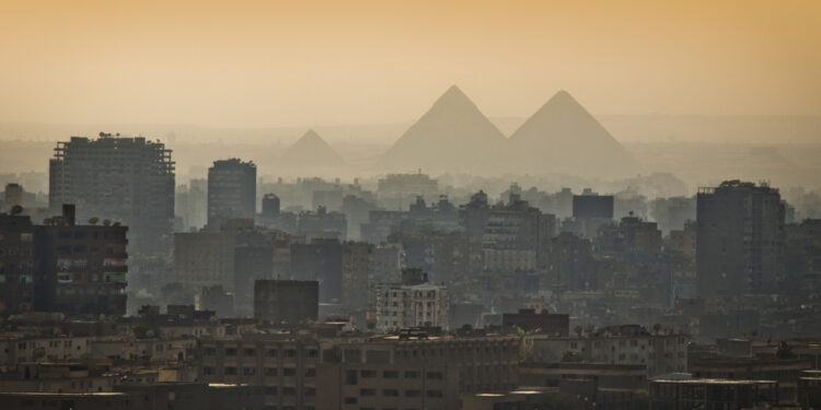 Cairo with Pyramids in the distance - Jason Benz Bennee/Shutterstock