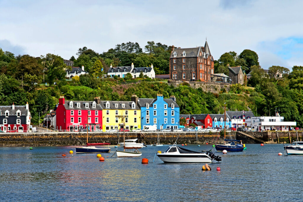 visiting the colorful houses in tobermory is a must-see attraction for things to do in scotland