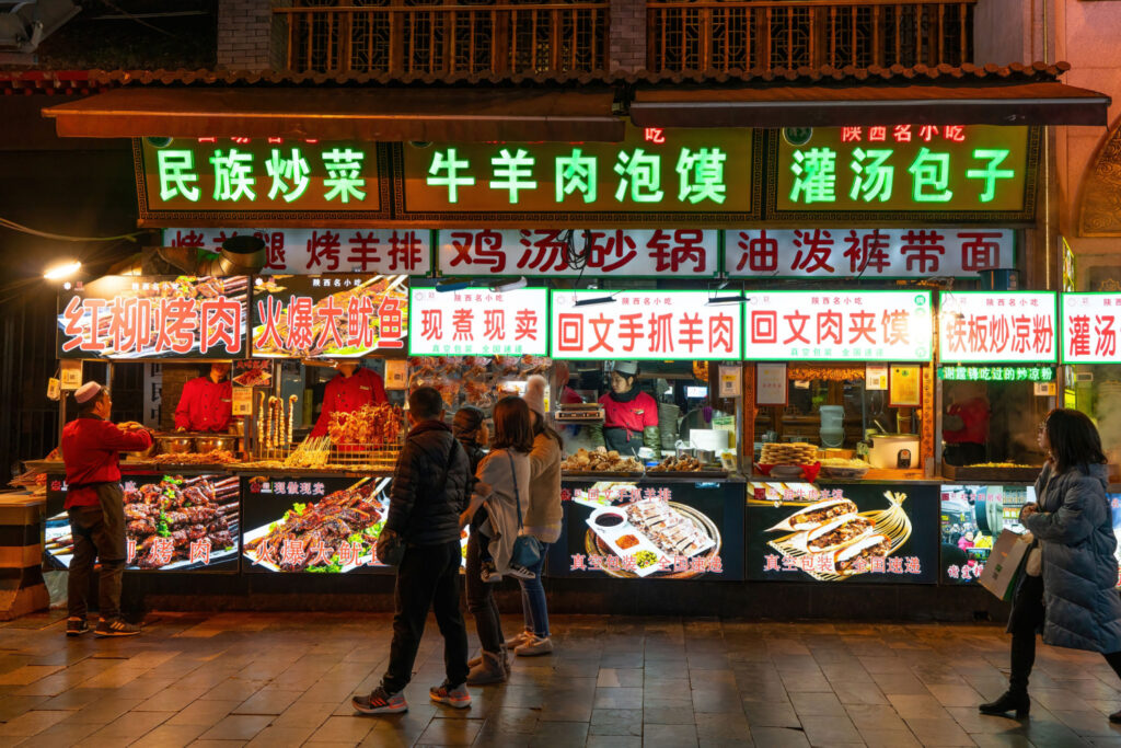 bustling local cuisine street food night market in Xi'an