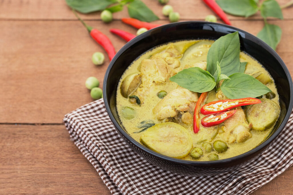 delicious vegan thai green curry, representing vegan dishes in asia