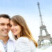 romantic couple embracing in front of eiffel tower - things to do in paris as a couple