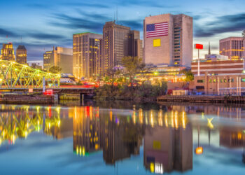 View of Newark, New Jersey, USA skyline on the Passaic River at dusk