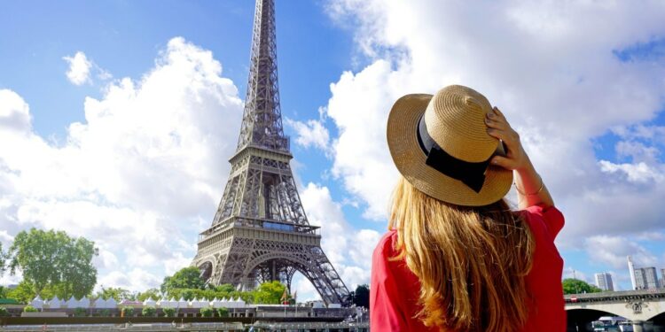 A girl enjoying view of Eiffel Tower in Paris