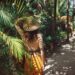 Girl walking on the tropical greenery in Tulum - Where is Tulum?