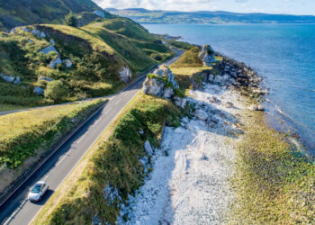 Driving in Ireland Antrim Coastal Road on eastern coast of Northern Ireland, UK