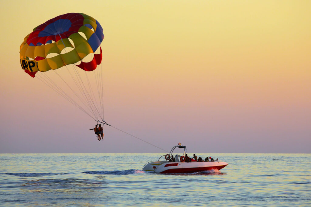 Group of people parasailing at Atlantic City beach