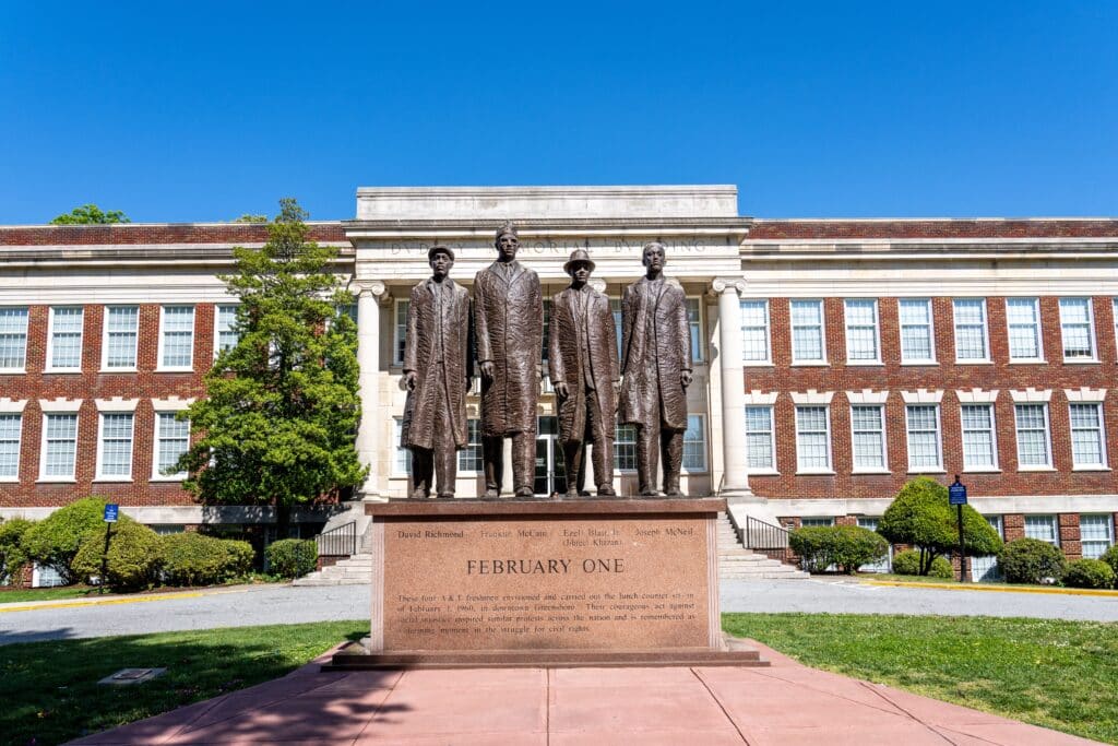 Greensboro, NC - "February One" sculpture, by James Barnhill, is a monument dedicated to the Greensboro Four who held a sit in protest of Woolworth's segregated lunch counters in 1960.