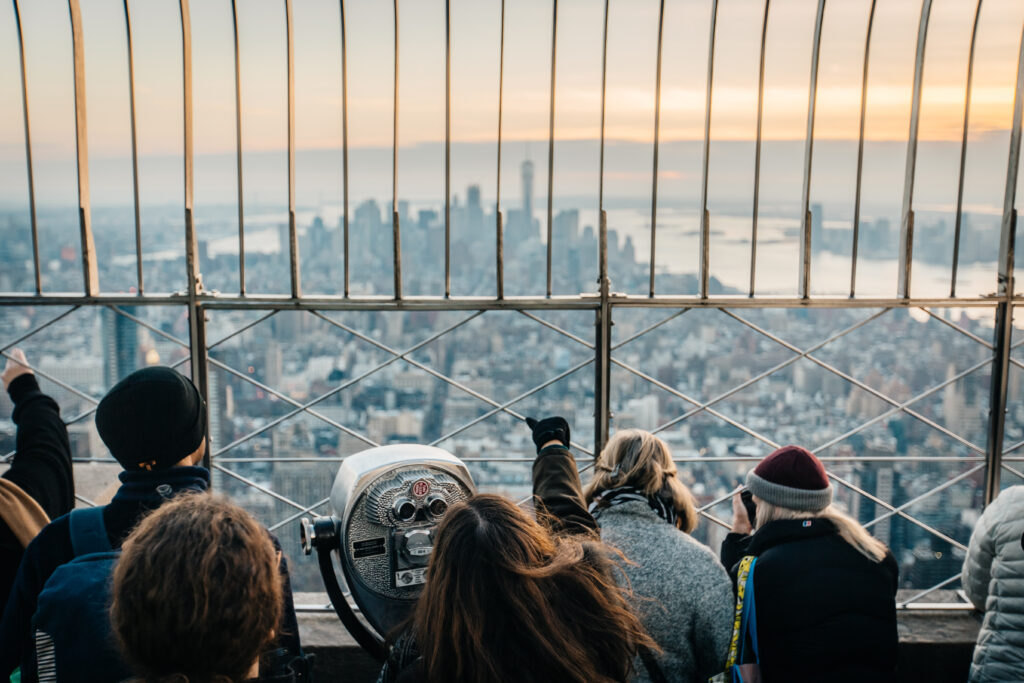 The viewing platform at the Empire State Building looking at the city skyline - Paper Cat/Shutterstock