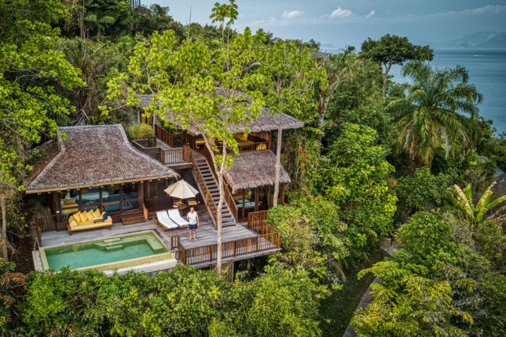 Aerial view of a luxurious wooden pool villa at Six Senses Yao Noi, Koh Yao Noi, Thailand