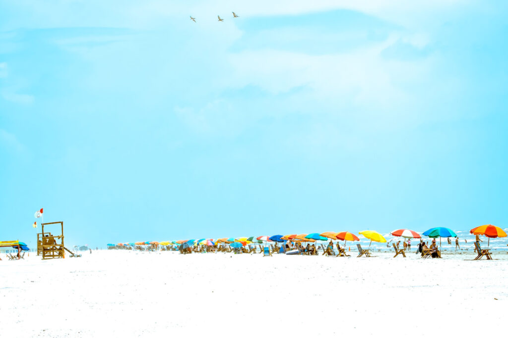 vibrant sight of colorful beach umbrellas at galveston island, texas