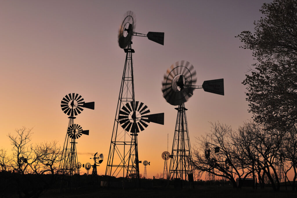 Silhouette of windmills at American Wind Power Center, Lubbock, Texass