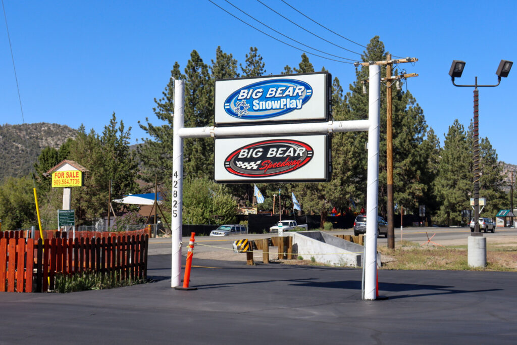 The Big Bear SnowPlay and Big Bear Speedway signs at Big Bear Lake