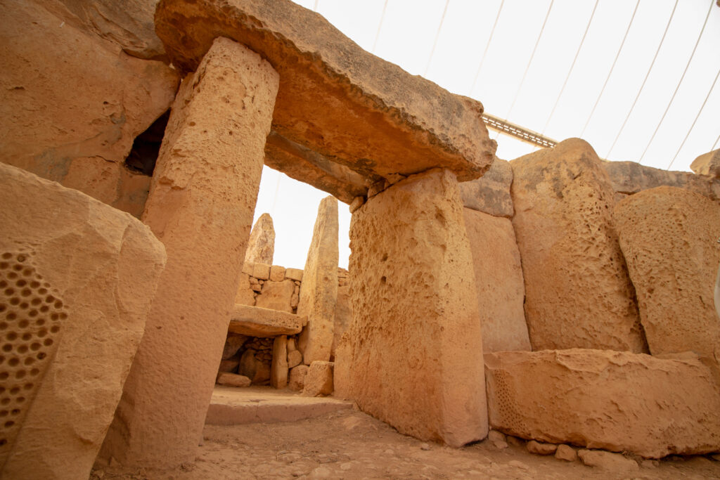 A megalithic stone doorway at the Hagar Qim Complex in Qrendi Malta.  Matthew Benn/Shutterstock