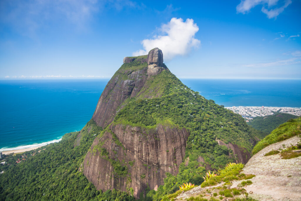 Wide view of the beautiful Pedra da Gávea (Gavea Rock) from a viewpoint at Pedra Bonita - Rio de Janeiro, Brazil.  Bernard Barroso/Shutterstock