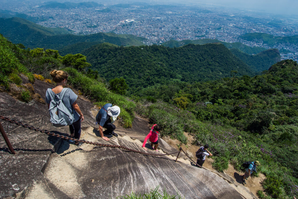 Hiking to Pico da Tijuca, the highest in Tijuca Forest National Park, Rio de Janeiro, Brazil.  vitormarigo/Shutterstock